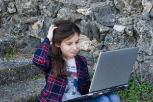 girl child using laptop 